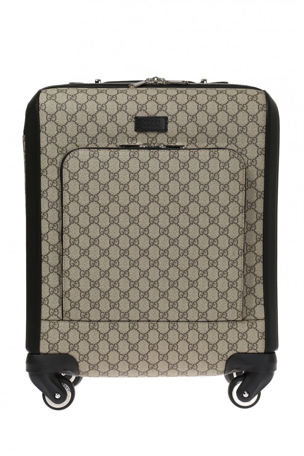 Gucci supreme suitcase sale